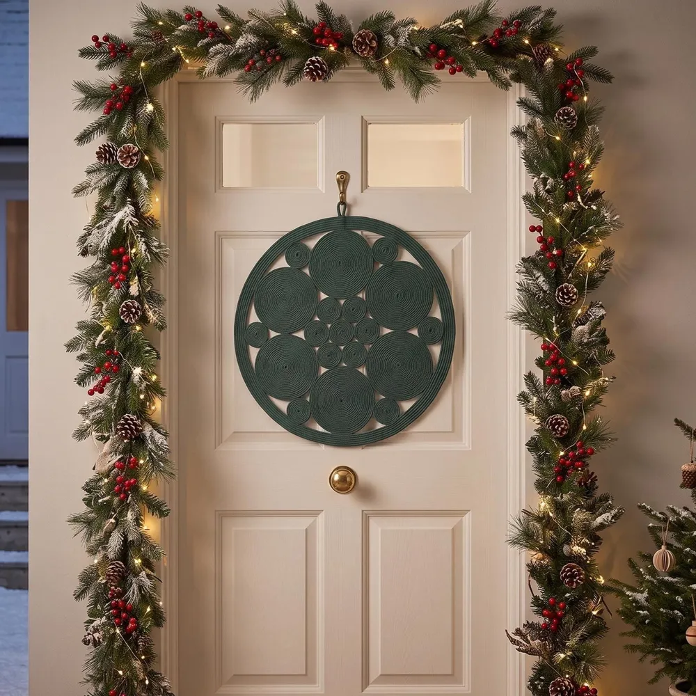 Two panels showing the burgundy rope entryway duo: the filled mandala door piece on a green front door and the open ring wall piece above a console