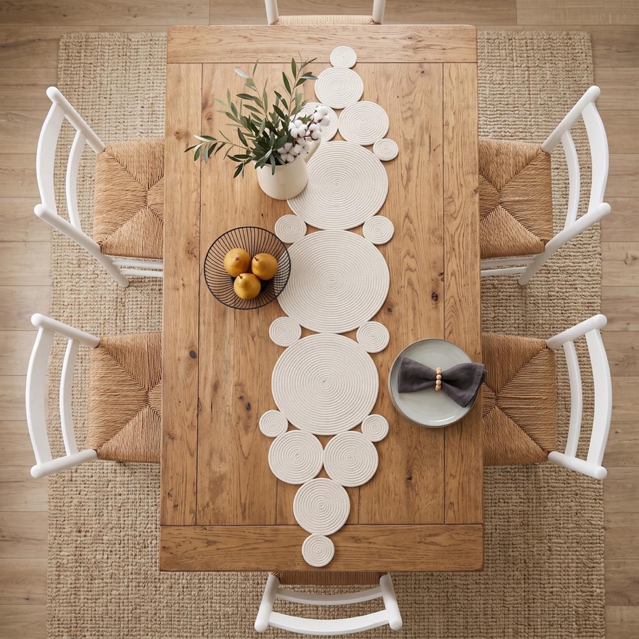 White cotton rope runner on a set table