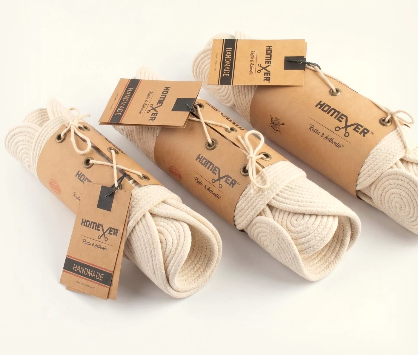 Cream cotton rope pieces rolled and wrapped in kraft paper with Homever tags
