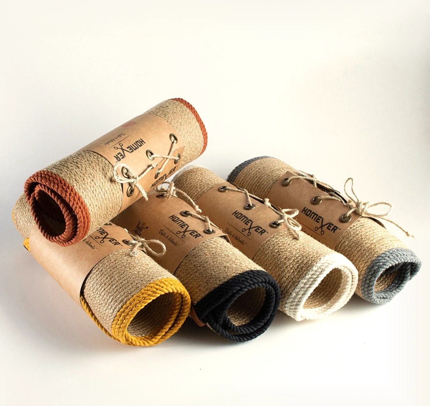 Natural jute pieces rolled and wrapped in kraft paper with Homever tags